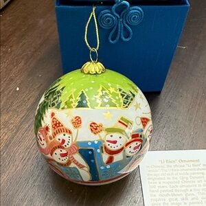 Festive Li Bien Snowman Ornament with Green and Red Accents